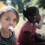 Children eating roasted marshmallows