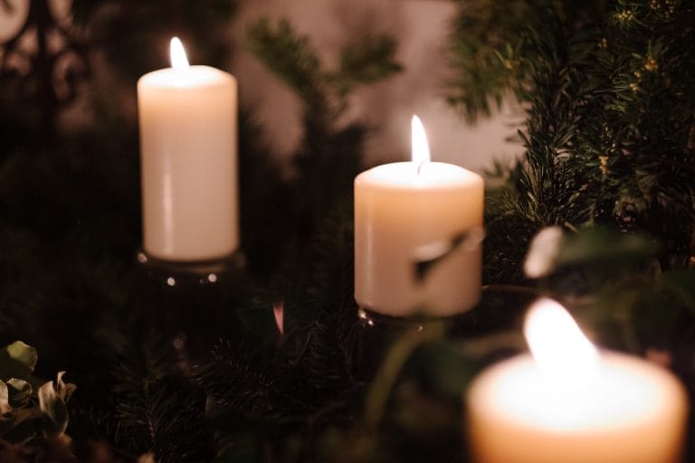 three candles in a Christmas tree