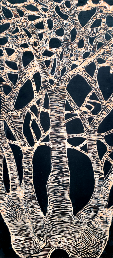 little person sitting at base of trees whose branches are anastomosing together