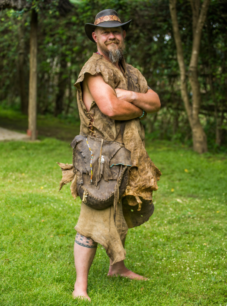 Portrait of instructor Jason Drevnak, dressed in hand-tanned buckskin clothes
