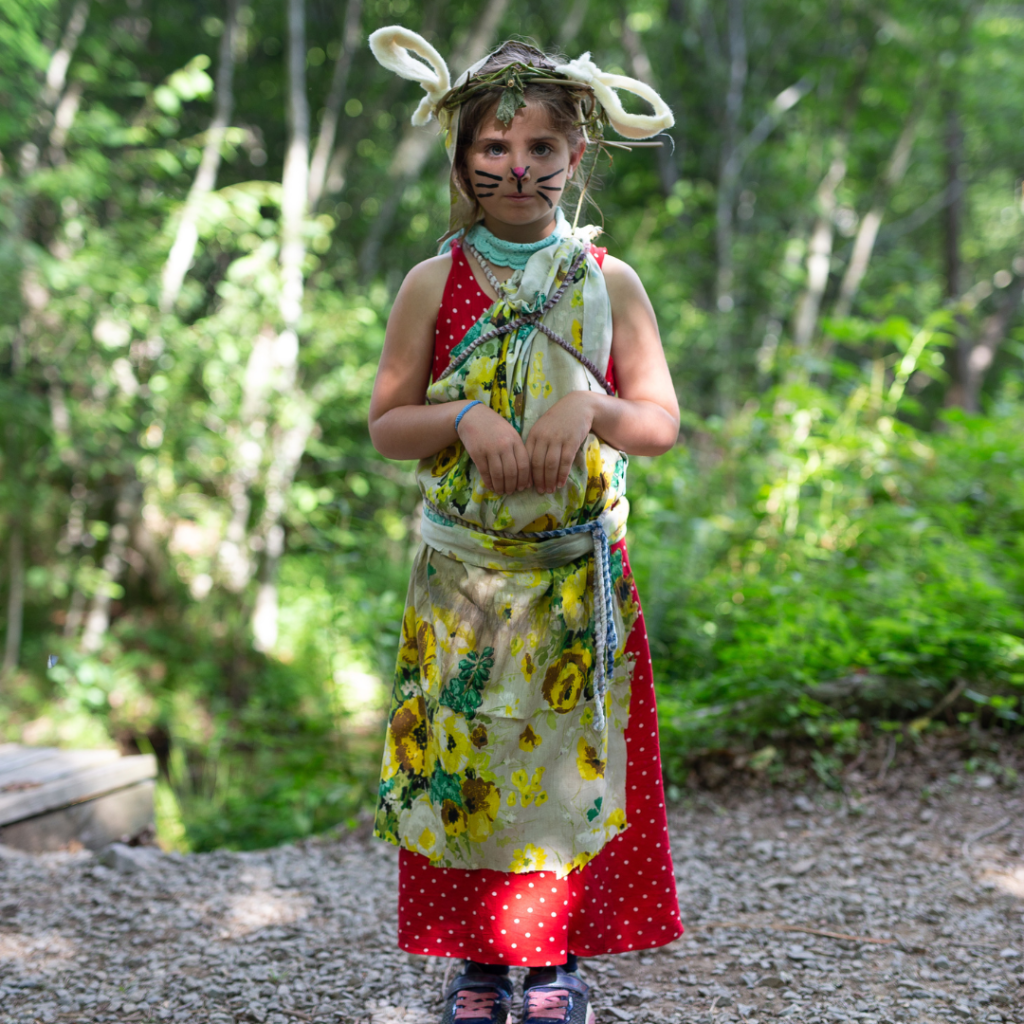 Young girl in hand-made animal costume for Youth Village parade