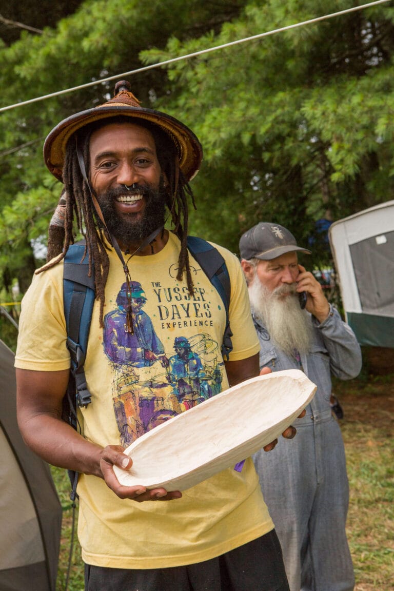 It’s So Important to Feel Heard… How Firefly Cares: Our Response to 2024 Annual Gathering Feedback 4 A person in a Firefly Gathering shirt with a hat holds a handcarved bowl
