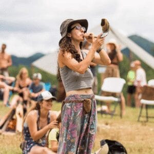 Kelsey Leahy blows a shafar to signal the class change at Firefly Gathering